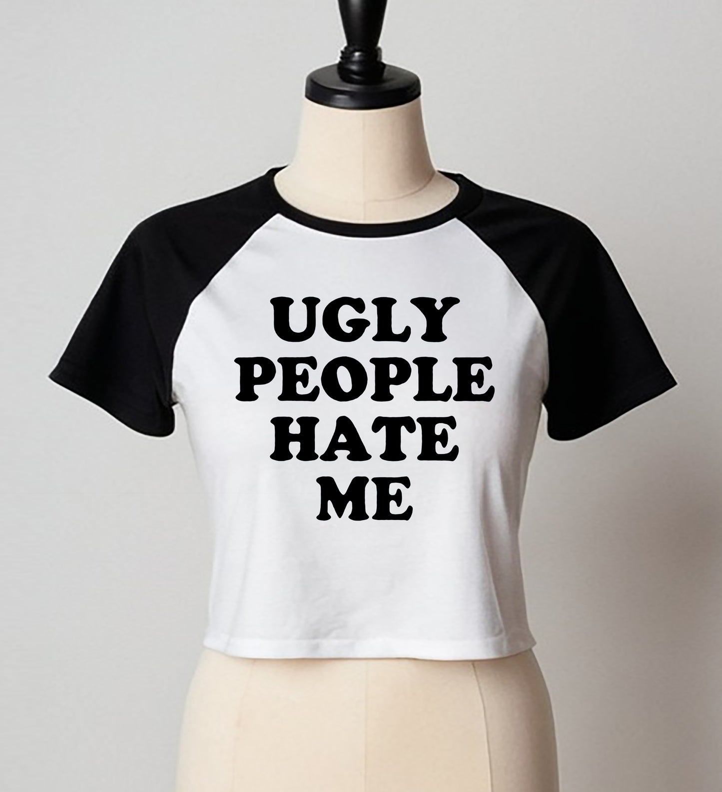 UGLY PEOPLE HATE ME | LADIES RAGLAN CROP TOP