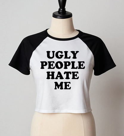 UGLY PEOPLE HATE ME | LADIES RAGLAN CROP TOP